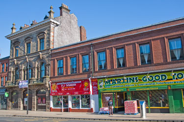 Nos. 48 SADACCA (Sheffield and District African Caribbean Community Association) (originally Samuel Osborn and Co. Offices); 42, P.J.Sisman, electrical store and Martins Goods to Go, afro-carribean, english and continental foods, Wicker