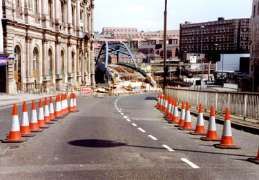 Commercial Street during the construction of Supertram, looking towards Park area showing (left) Canada House (the old Gas Company offices), and (right) Park Hill Flats