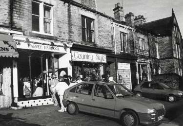 Shops on Fulwood Road showing (l.to r.) No. 360 Harvey Haddock, fish and chip shop, No. 358 Country Style, outfitters, No. 356 Paul Butler, gents hairdresser and No. 354 C. Barker, shoe repairs