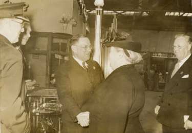 Johnny Porter of (Lee of Sheffield Ltd.) Arthur Lee and Sons Ltd., steel manufacturers, greeting Lord Mayor, Alderman Grace Tebbutt, at the British Industries Fair, Olympia, London