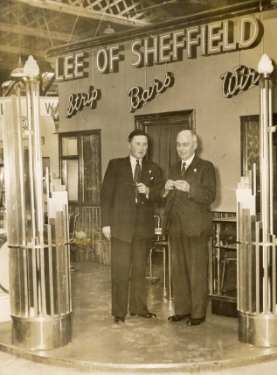 Mr Omer and Mr T. Jubb at the stand of (Lee of Sheffield Ltd.) Arthur Lee and Sons Ltd., steel manufacturers, at the British Industries Fair, Olympia, London