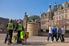 Policeman and Paramedic on standby in the Peace Gardens with the Town Hall and one of the Cascade Fountains (dedicated to the memory of Chartist, Samuel Holberry) in the background 