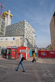 Telephone Boxes and Construction Workers Cabins at the junction of Norfolk Street and Charles Street with City Lofts Apartments and QPark multi storey carpark (known locally as the Cheesegrater) in the background