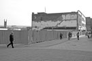 The remaining property formerly Nos 101-103, Ethel Austin; 05 and 107-109, Home Bargains to be demolished for the new Market, The Moor with St. Mary's, Bramall Lane in the background 