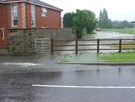 Flooding on Nether Lane, Ecclesfield. Water flowing out of football field next to Nightingale Residential  Home