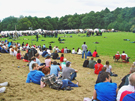 Crowds watching military re-enactments at Norfolk Heritage Park during Sheffield Fayre