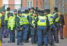 Policemen waiting to deal with expected protests during the Liberal Democrat conference which took place at Sheffield City Hall 