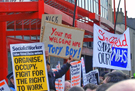 Protesters demonstrating against proposed financial cuts at the Liberal Democrat conference which was held at Sheffield City Hall