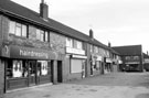 Shops on Halifax Road below junction with Doe Royd Lane