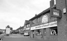 Shops on Halifax Road below junction with Doe Royd Lane