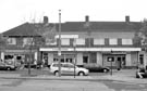 Shops on Margetson Crescent, including the Post Office