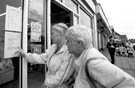 Looking at job adverts at Margetson Crescent Post Office