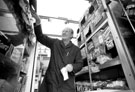 Grocery delivery man working on Mansel Road from his old Fletchers bakery van