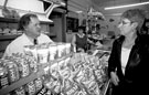 Butcher Erich Suck in his butcher/grocery shop, Margetson Crescent