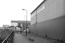 GripBar.co.uk, along Five Weirs Walk, at the entrance off Newhall Road, Newhall Bridge, Attercliffe looking towards former Gun Shop, River Don Works