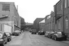 Effingham Street with The Tempered Spring Co. Ltd., Spring Works (left) and Cromwell Tools, Waverley House, Waverley Works (right) formerly occupied by Henry Rossell and Co Ltd, looking towards Norfolk Midland Railway Bridge