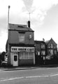 Dhow Cafe, No. 33 Attercliffe Common with the former Attercliffe Vestry Offices (No.43) used by Yemeni Economic Training Centre in the background