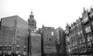 The fascade of Carmel House (right), Fargate from Norfolk Row during rebuilding with the Town Hall and rear of properties on Surrey Street