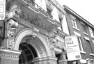 Carved detail over the entrance to Wharncliffe House, No. 44 Bank Street and the junction with Scargill Croft