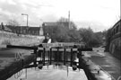 View: c01900 SYK Navigation, Tinsley Locks looking from Tinsley Bridge with housing on Greasbro Road in the background