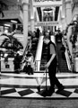 Cleaning Staff with the Escalators leading to the upper level of the Arcade in the background, Meadowhall Shopping Centre, Meadowhall