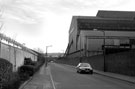 Carbrook Street near the entrance to the Five Weirs Walk with Sheffield Forgemasters, River Don Works right looking towards Attercliffe Common