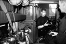 Staff checking apparatus at the start of shift, Ringinglow Road Fire Station