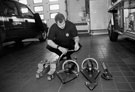 Staff checking apparatus at the start of shift, Ringinglow Road Fire Station