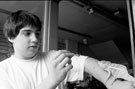 Shop Assistant, Dominic Podmore feeding a panther chameleon, The Snake Shop, No. 678, Attercliffe Road