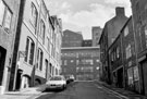 Walsh Court originally the premises of John Walsh Ltd., Cabinet Works, furniture depository and factory.(left), Bailey Street looking towards West Point Apartments, Trippet Lane