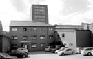 L. Grunwerg Ltd.,I.Grunwerg Ltd., cutlery wholesale distributers, Bailey Lane with Sir. Robert Hadfield Building, University of Sheffield in the background