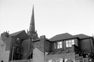 Rear of properties on Carver Street including St Matthew C. of E. Church from Backfields 