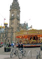 Carousel at the top of Fargate with the Town Hall in the background