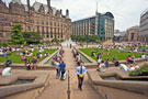 The Peace Gardens at lunch-time, looking towards the Town Hall, St Paul Mercure Hotel and the Winter Gardens.