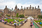 The Peace Gardens on a hot sunny lunchtime, looking towards the Town Hall