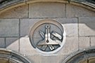 Carving above windows of The Graduate public house, No. 94 Surrey Street