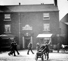 Punch Bowl Inn, No 140, South Street, Moor. Ice cream vendor on right