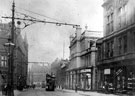 View: s00165 Church Street looking towards High Street including tram No. 235. Orchard Chambers and shops on right