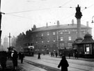 Moorhead. Crimean Monument and tramway and bus waiting rooms, right, Public Benefit Boot Co. Ltd., boot dealers and Nelson Hotel in background