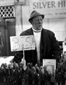 View: s01945 Market trader in possibly Sheaf Market showing pre-decimal price tags