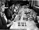 Final Inspection of cutlery before packing at Mappin and Webb Ltd.