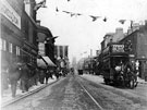 View: s02736 South Street, Moor, decorated for Queen Victoria'a Jubilee, looking towards St. Paul's Church, Jessop Street, right, premises on left include Nos. 86 - 90 John Atkinson, draper (with large flag), No. 94 J. Puttrell and Co., painters