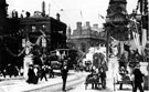 View: s03283 High Street and Fitzalan Square decorated for the royal visit of King Edward VII and Queen Alexandra, General Post Office and Haymarket, left