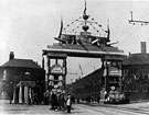 View: s03367 Decorative arch on Savile Street to celebrate the royal visit of King Edward VII and Queen Alexandra, sponsored by John Brown and Co., designed and erected by G.H. Hovey