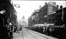 View: s03407 Unidentified royal visit passing Fargate, possibly Elizabeth, Queen Mother, 1934. Shops include No 41/43, J.B. Eaton Ltd., Drapers and Marsh Brothers (Electricians) Ltd., No 37, H.E. Closs and Co. Ltd., Silk Merchants