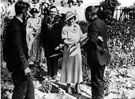 View: s03449 William Edwards, President of the Horticultural Society presenting a stainless steel fork to the Duchess of York at Deep Pits Allotments, City Road, Park, with Lord Mayor, Fred Marshall