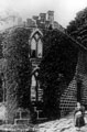 Annie Thorpe, local midwife, outside Watch House at High Bradfield. Built in 1745 as a guard against bodies been stolen fron the churchyard