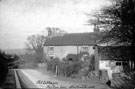 Old cottages, Nos 54 and 56, Norton Lees Lane, looking towards Norton Lees Road junction. Situated opposite Lees House, next to St. Paul's Church. Cutting on right led to a water pump. Demolished to make way for Norton Lees Garage