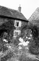 Cottage on Little Norton Lane, barns belonging to Park Farm can be seen to the right