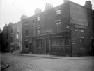 Boston Street (formerly New George Street), at junction of Arley Street (formerly Cross George Street). George Hotel, No. 52, Boston Street. Demolition of back to back houses, Nos 54-60, on left (Court No 10 at rear)